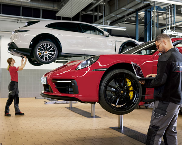 Porsche Technician performing service